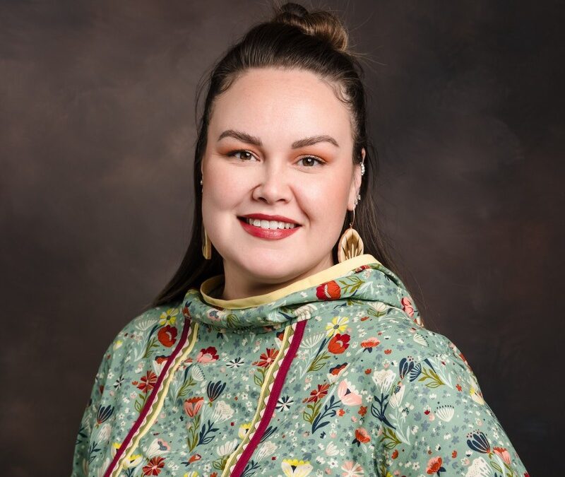 A portrait of Jayme Thomas.